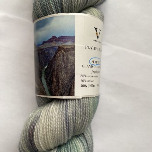 One skein of gray, blue, green yarn.