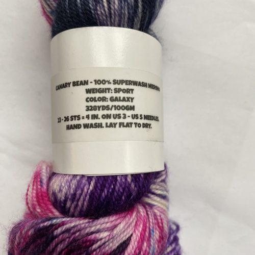 One skein of pink, purple, blue, white yarn.