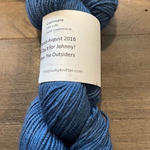 Skein of bright blue yarn.