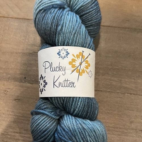 A skein of light blue yarn.